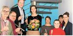 Gratulation für AKI-Geschäftsführerin Dr. Monika Erath (Mitte) von Hans-Benno Wichert (3.v.l), Siegfried Schwab (2.v.l.) und Bernd Meyer zu Berstenhorst (l.) und aus dem AKI-Team Dr. Teresa Walter (4.v.r), Irina Fomin (3.v.l.), Olga Polonska (2.v.l.) und Domenica Deffner (r.).