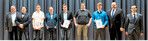 Landesinnungsmeister Kurt Neuscheler (l.) ehrte drei der frisch gebackenen Land- und Baumaschinenmechatroniker für herausragende Prüfungsleistungen.