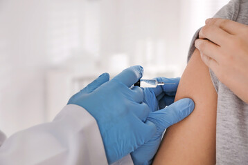 Die Impfung gegen Grippe schtzt vor einer Infektion.