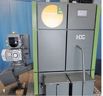 Die Holzhackschnitzelkessel der Marke HDG werden mit integrierten elektrostatischen Filtern angeboten.