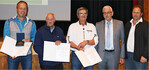 Für ihren jahrelangen Einsatz im Vorstand und Aufsichtsrat wurden (v. l.) Wolfgang Fässler (33 Jahre), Bruno Diem (33 Jahre) und Joachim Bertsch (27 Jahre) von Harald Hörner, BWGV, mit der Ehrenmedaille ausgezeichnet, rechts im Bild der Vorstandsvorsitzende Markus Stützenberger.